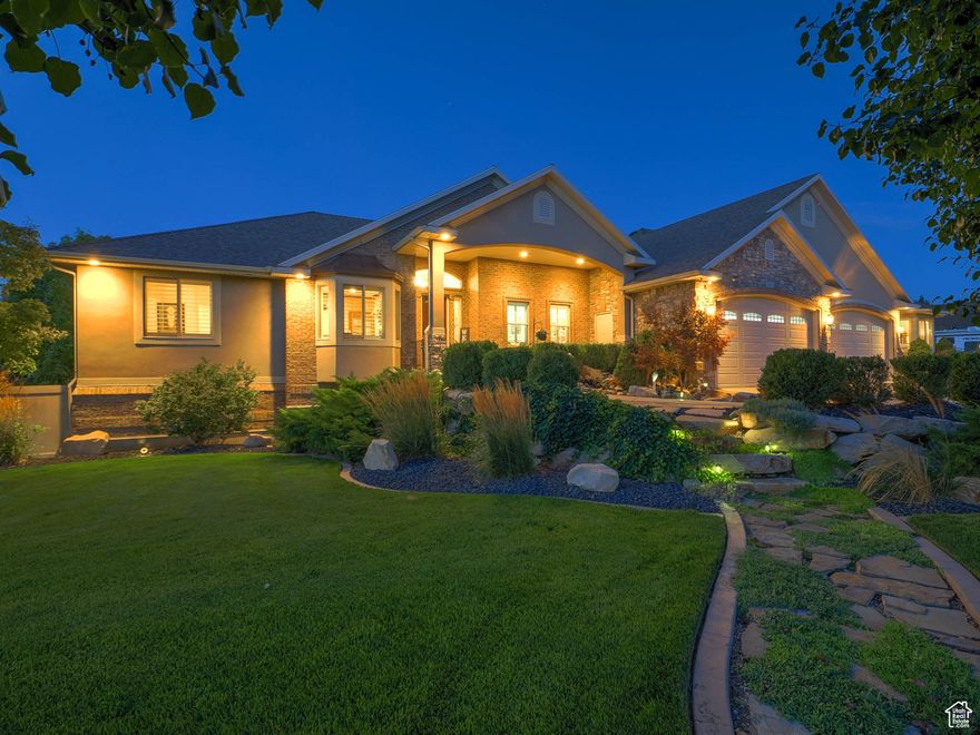 Welcome to this updated custom estate on a 1.10-acre west-facing lot with stunning Wasatch Mountain views. Inside, the heart of the home is the sprawling chef's kitchen, designed for both daily living and entertaining. It features double wall ovens, a 48" gas cooktop with pot filler, prep sink, oversized butler's pantry, custom cabinetry, granite countertops, and top-tier appliances.  Throughout the home, thoughtful upgrades like LED lighting, low-E windows, and enhanced attic insulation boost efficiency and comfort. With its blend of luxury finishes, versatile living options, and unmatched garage space, this home truly offers something for every lifestyle-plus room to expand even further. The full walkout basement offers 9-ft ceilings and abundant natural light, creating a true extension of the main living space. It also includes a finished ADU constructed with Sound walls for private quarters, perfect for multigenerational living or rental income. Car enthusiasts and hobbyists will love the garage space: an attached 1,600 sq. ft. heated and insulated garage that easily fits four lifted trucks, plus an incredible 4,200+ sq. ft., 3-story detached garage/workshop. This detached space is tall enough for a 40' RV and includes full electrical, with RV Dump . With unfinished living space already framed with electrical and plumbing, it's ready for your vision-whether that's an additional ADU, studio, or office. A 1,700-degree-rated safe room with a secure safe door adds a unique, high-value feature.  Square footage provided as a courtesy estimate from prior appraisal. Buyer advised to obtain independent measurement.