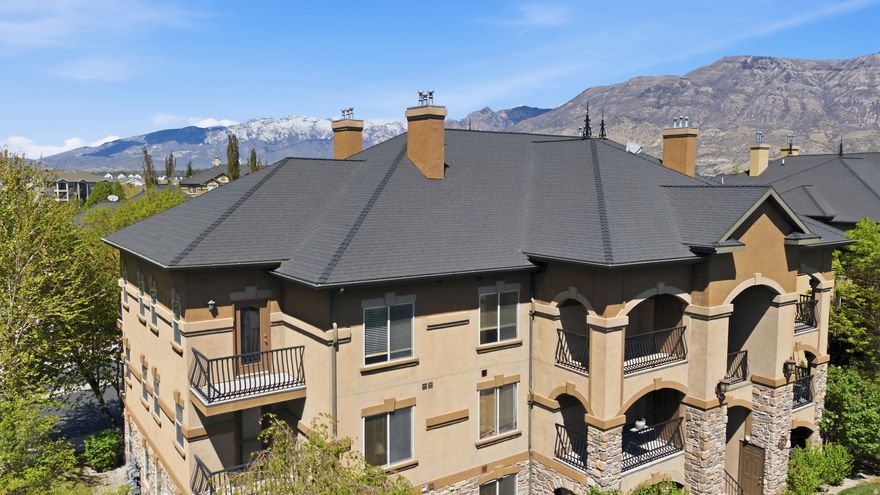 Enjoy peaceful evenings and breathtaking sunsets from your top-floor, south-facing covered deck in the highly sought-after Belle Monet community. Take in sweeping views of the mountains and valley as you unwind in a space that truly feels like home.  This beautifully designed condo features an open floor plan and oversized windows that fill the home with natural light. This home is move in ready, with professional cleaning, new carpet, and LVP throughout home.    Additional highlights include a one-car garage, a reserved parking space, and ample guest parking. You'll also appreciate the convenience of a private, locked storage closet located right on the balcony.  Residents of Belle Monet enjoy access to exceptional HOA amenities, including a clubhouse, park, pool, hot tub, and media package-perfect for both relaxation and entertaining.