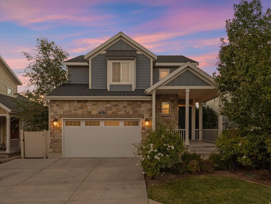 Nestled in the heart of Holladay's prestigious Olympus Orchards gated community, this immaculate two-story home offers the perfect blend of timeless design, modern luxury, and an unbeatable location. Ideally situated near the newly rebuilt Olympus High School and other top-rated schools, residents also enjoy quick access to upscale shopping, dining, and parks, as well as the world-class skiing and recreation of the nearby canyons. The New Englandinspired exterior features durable cement board siding, elegant stone accents, and crisp white trim for lasting curb appeal. Inside, the home showcases premium designer finishes throughout, including rich hardwood floors, plantation shutters, two-tone paint, stylish hardware, recessed lighting, and upgraded millwork. The grand two-story entryway greets you with a stunning chandelier and an elegant open staircase adorned with beautifully milled white railings. At the heart of the home, the gourmet kitchen is a true showpiece, featuring custom white cabinetry, honed marble countertops, a chic lantern-pattern tile backsplash, stainless steel appliances, and a spacious center island. The sun-filled dining area opens seamlessly to the covered deck and patio, perfect for year-round entertaining. The inviting great room features large windows that frame views of the lush backyard and a cozy gas fireplace with a statement tile hearth and custom mantel. Upstairs, the luxurious primary suite offers a serene retreat with an organized walk-in closet, soaking tub, separate shower, and double vanity. The finished lower level provides even more living space with high ceilings, new carpet, a comfortable family/rec room with a charming play nook, a fourth bedroom, a three-quarter bath, and a generous cold storage room. Outside, the private backyard oasis is beautifully landscaped with a lush lawn, mature trees, privacy fencing, and a covered patio, ideal for outdoor dining or relaxing. This exceptional home delivers luxury living in one of Holladay's most desirable gated communities, offering both comfort and convenience for a truly elevated lifestyle.