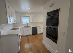 Photo of 411 E WILFORD AVE, Murray, UT 84107 (MLS # 2188627)