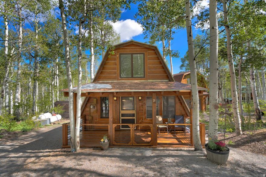 Located in the gated Timber Lakes community near Heber City, this updated cabin-style home is designed for practical year-round mountain living with convenient seasonal functionality. Set on 1.01 wooded acres, the property includes a detached oversized 2-car garage with upper-level flex/storage space plus an additional workshop area at the rear of the garage ideal for tools, outdoor equipment, hobby space, or recreation gear storage. The home features forced air heat, a chef's kitchen with high-end appliances, covered decks, mature trees, mountain views, wired ethernet, and a wood-burning heat source. Interior utility routing through the center of the home supports winter usability, along with an accessible drain and shutoff setup for simplified seasonal management. Conveniently located near trails, Heber Valley, Deer Creek Reservoir, Jordanelle, and Deer Valley East Village. Nearby Amenity List Timber Lakes gated entrance ( 1 mi), Heber City, Main Street shopping & dining ( 12 mi), Deer Creek Reservoir ( 10 mi), Jordanelle State Park ( 15 mi), Deer Valley East Village / Mayflower base area ( 19 mi), Park City Main Street ( 23 mi), Wasatch Mountain State Park ( 14 mi)   Square footage figures are provided as a courtesy estimate only and were obtained from independent measurement.