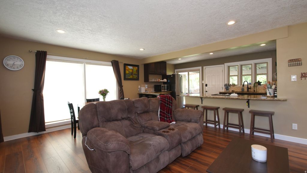 Photo of 1863 E VILLAGE GREEN RD, Cottonwood Heights, UT 84121 (MLS # 2155090)