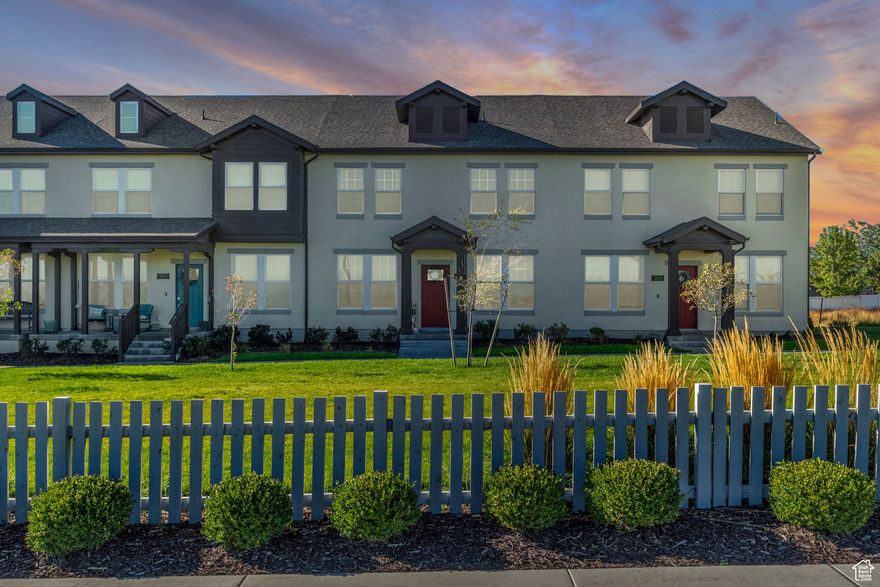 This stunning 2-story townhome offers an open and inviting floor plan with a beautifully updated kitchen featuring a freestanding gas range with electric oven, solid surface countertops, island bar seating, and crisp white cabinetry. Upstairs you'll find 3 spacious bedrooms, including a primary suite with vaulted ceilings, accent walls, and a private bath with a walk-in shower. The additional bedrooms are generously sized, with a full bath conveniently located off the hallway. The garage includes overhead storage and direct access to extra space beneath the stairs. Located in Daybreak, you'll enjoy incredible community amenities along with the exciting addition of the new nearby baseball park. Don't miss this one-it won't last long!