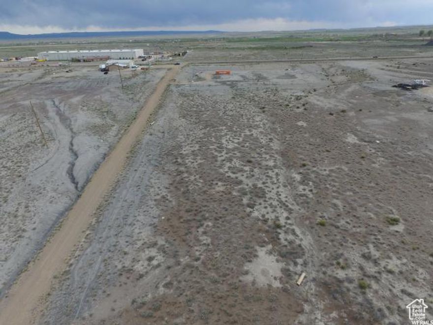 5.87 acres of Commercial/Industrial property off of Ridge Road in Wellington! Located across from Komatsu. All utilities are either on the property or in the road. An additional 5.49 acres available for sale also. (see MLS 1983084)   Seller will consider Seller Financing this property. Call for details.