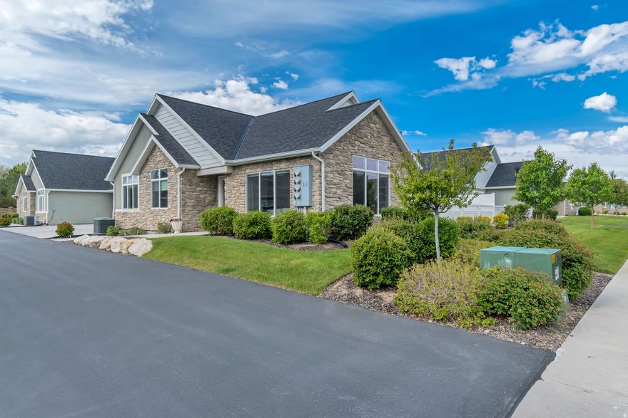 ***OPEN HOUSE this Sat. May 16th, 11-2pm****  Welcome to the Villas at Legacy Farms*** One of Utah County's most beautifully maintained 55+communities.  And that's not all....  Wait until you see this beautiful, light and bright ranch-stye patio home!.. You'll love the  large open floor plan with vaulted ceilings. 2 Main floor living rooms (one could be an office) white paint throughout including a beautiful kitchen w/white backsplash. white quartz countertops, and pretty patio right off your breakfast nook. There are 2  large bedrooms, which includes a large master suite w/large master bath & walk-in closet.    This home features a large bonus room upstairs which can be used a guest bedroom/family room of your choice?.A full bathroom is available upstairs too. Enjoy the views of the lake from upstairs.One of the outstanding features of this home is ample storage space and the extra -length garage, which provides space for large cars or a dedicated workshop area.  This is a vibrant community with a beautiful clubhouse, movie theatre , state of the art weight room and kitchen provided as well. This is resort living at it's finest - no stairs to your entry, and wide streets with only neighborhood traffic.  This is located across from the beautiful Patriot park and a few steps away from Saratoga's brand new library and city buildings.  Close to Talon's golf course and within a few miles to all local shopping and restaurants.  It is a wonderful location for entertainment, outdoor activities all while enjoying beautiful mountain views! Close to hospitals and Dr offices.  It's the perfect place to retire in comfort and luxury!  This lovely home is move in ready.OPEN HOUSE will be this Sat. 11-2pm! Please drop by and this won't last long!