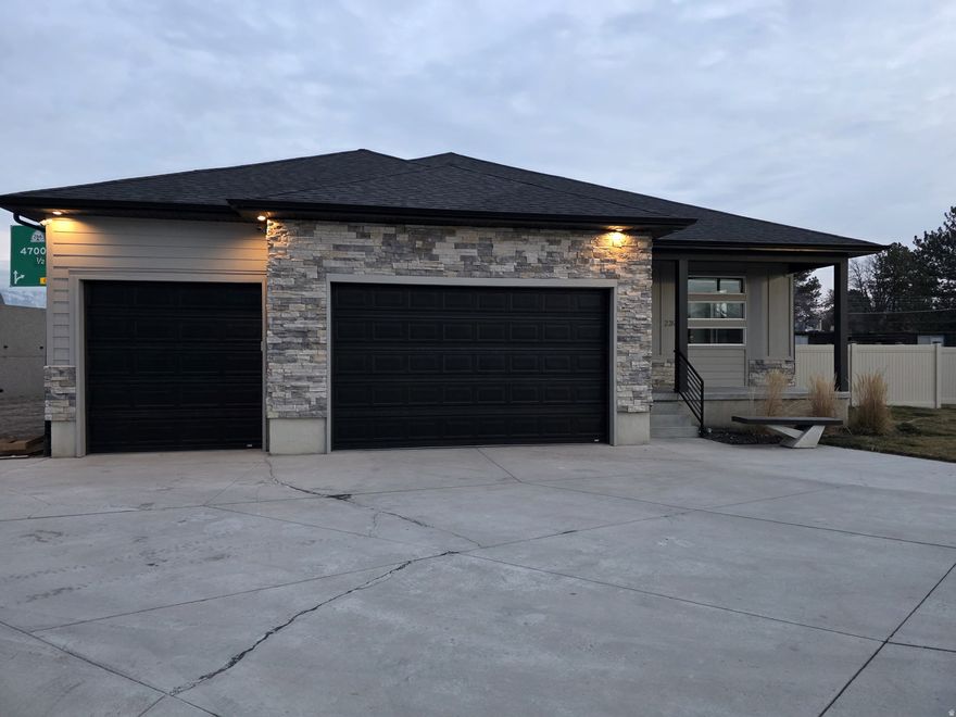 This contemporary home showcases stylish upgrades throughout, beginning with a bright, modern kitchen featuring quartz countertops, sleek cabinetry, an electric range, and an over-the-range microwave. The open great room and 9-foot ceilings on the main level create an inviting space ideal for both everyday living and entertaining. Fully finished with 8 bedrooms, 5 bathrooms, 2 kitchens, and 2 laundry rooms, this home is perfectly suited for a large or multi-generational family. Upstairs, the primary suite offers a spa-inspired bathroom with a designer mosaic tile shower, double vanities, and a spacious walk-in closet. A generously sized upstairs laundry room adds everyday convenience. Located just minutes from Valley Fair Mall, Costco, and with easy access to I-215, this home combines modern comfort with an unbeatable location.