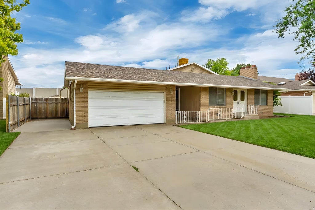 Photo of 1447 E HOLLOW DALE DR, Salt Lake City, UT 84121 (MLS # 2172996)