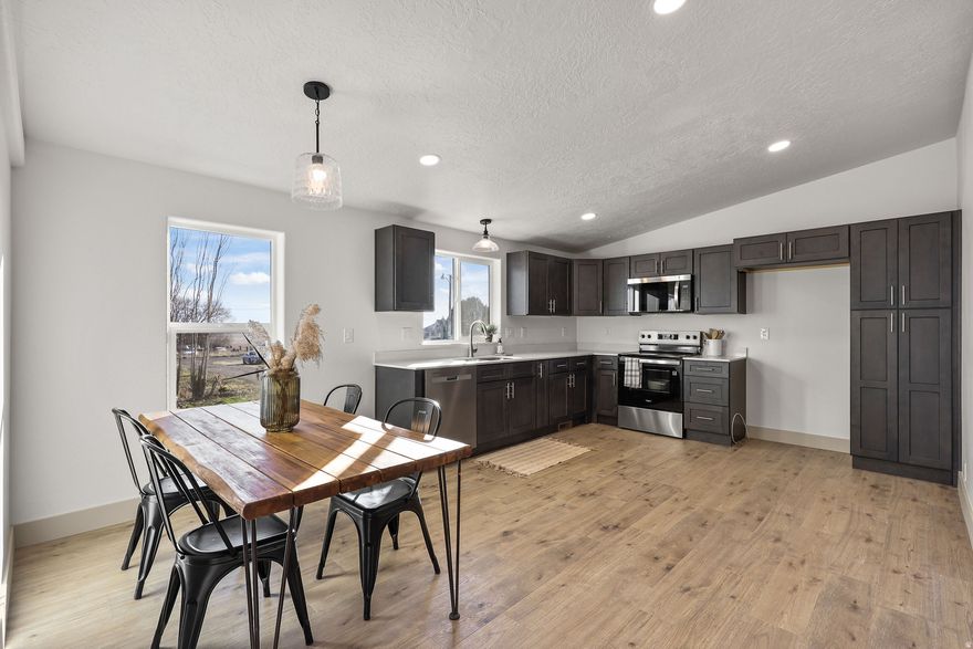 Nicely remodeled home, with 1.50 water shares! All new HVAC system, new plumbing, cabinets with quartz countertops. New windows. New flooring, and carpet throughout. Master suite with walk-in closet, double vanity, separate deep tub and shower with custom tile.