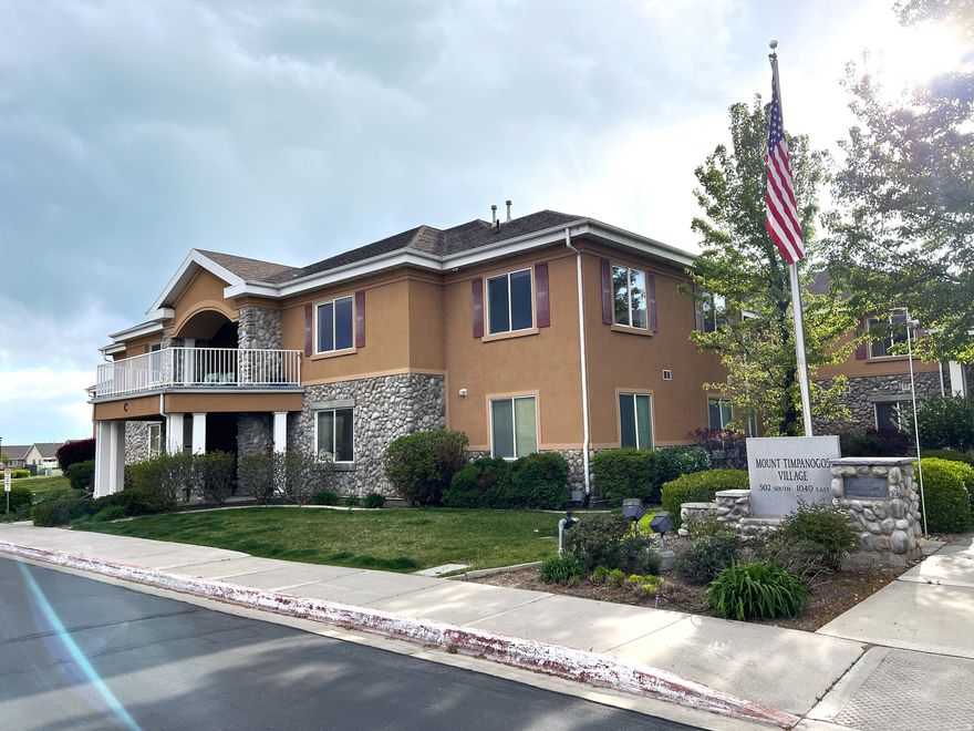 Welcome to the largest and most spacious one-bedroom unit in highly sought-after Timpanogos Village, Utah County's premier 55+ community. This beautifully updated condo offers comfort, convenience, and a vibrant lifestyle in a well-maintained setting. Step inside to discover a bright, open floor plan featuring 9-foot ceilings that create an airy, expansive feel throughout the main living area. The generous living room provides ample space for relaxing or entertaining, while the adjoining kitchen is equipped with granite countertops, bar seating, abundant cabinetry, and plenty of storage. Recent updates include new luxury vinyl plank (LVP) flooring, fresh paint, and updated faucets, making this home truly move-in ready. The large bedroom offers excellent space and comfort, complete with a walk-in closet and easy access to a well-appointed bathroom. Enjoy the added convenience of a private storage shed, providing extra space for your belongings. Timpanogos Village residents enjoy beautifully landscaped grounds and a wide range of amenities, including a pool, hot tub, clubhouse/party room, game room, media library, and on-site beauty salon-perfect for an active and social lifestyle. The monthly HOA fee covers cable TV, internet, water, sewer, trash, and full grounds maintenance, offering low-maintenance living and peace of mind. Don't miss this opportunity to own a spacious, updated home in one of Utah County's most desirable 55+ communities. Buyer to verify all information.