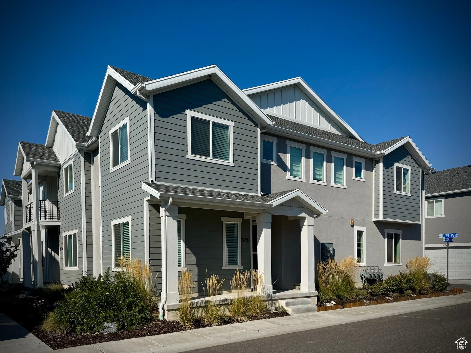 Gorgeous newer home, with even newer updates: new carpet, new kitchen (since build), new Ruvati sink with accessories, and more! This end unit townhome has loads of natural light, with many windows and the broadside facing south. You'll love the light, open, airy feel! Here is a list of amazing appliances included: Haier fridge, Samsung solid cooktop (never used) microwave, washer, dryer (many with wifi), on-demand water heater, water softener, reverse osmosis filter, and some motorized blinds. With all of that, this home is BETTER than new!