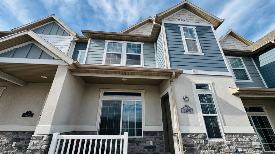 Welcome to 5685 W Pelican Ln - a well-maintained 3-bedroom, 2.5-bath townhome nestled in the Westridge community of West Valley City. Built in 2018 and spanning 2,285 square feet across three levels, this home offers room to spread out without sacrificing style or convenience. The main level features an open kitchen with granite countertops, built-in dishwasher, gas range, and disposal - all flowing into a comfortable dining and living space. Head upstairs to find all three bedrooms, including a primary suite with a private bath and walk-in closet. A full basement provides excellent additional storage. The 2-car attached garage, concrete driveway, covered patio, and fully landscaped yard with automatic sprinklers round out an impressive exterior. Carpet and laminate flooring throughout, window blinds included.  This is a short sale - all terms subject to lender approval.  Square footage figures are provided as a courtesy estimate only and were obtained from County Records .  Buyer is advised to obtain an independent measurement.