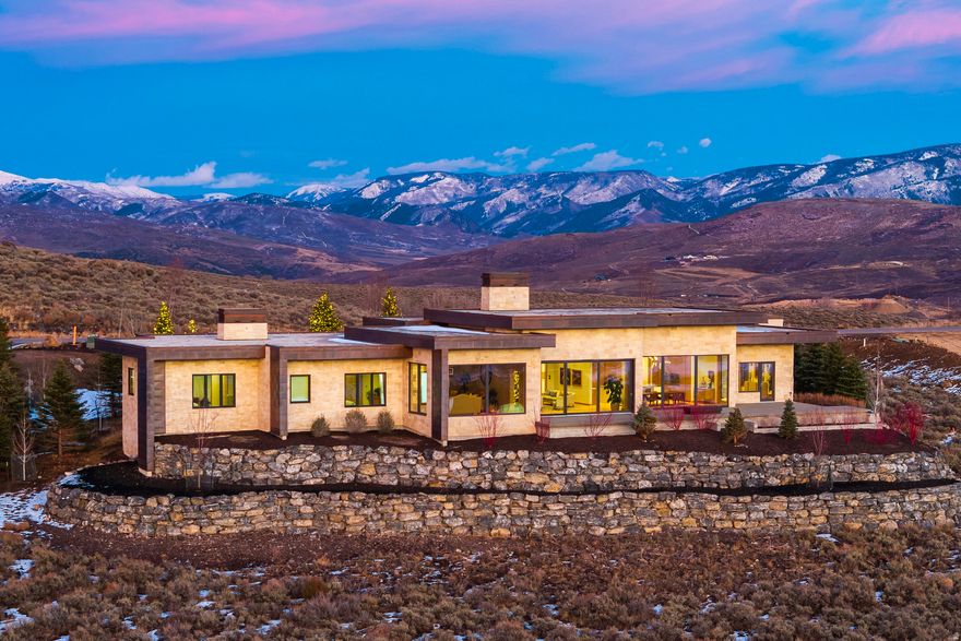 Step inside this newly completed, single-level Vista Point residence, crafted with a thoughtful, fluid layout that lives effortlessly and captures the comfort, quiet, and refinement discerning Promontory buyers expect. With 6,185 sq ft, 5 bedrooms, and 5 baths, this home blends European craftsmanship, advanced efficiency, and a modern mountain aesthetic into a seamless living experience.