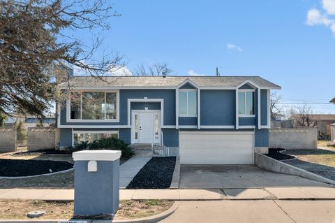 Photo of 3329 W SUNNYBROOK DR, West Valley City, UT 84119 (MLS # 2128571)