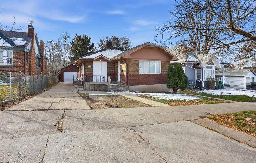 Investor alert! Updated Ogden duplex with a proven $3,000/month rental history. Perfect for house hacking (live in one unit while the other helps pay the mortgage). This property presents a rare opportunity to build equity while generating income. Whether you're looking to expand your rental portfolio or live in one unit while offsetting your mortgage, this well-maintained up-and-down duplex offers incredible flexibility and income potential. Recent updates make this property move-in ready, including brand-new carpet, fresh interior paint, new exterior doors, and a new garage door with an opener, giving it a clean, updated feel for future tenants or owners. All appliances are included. The duplex offers  2,512 square feet with 2 units, totaling 5 bedrooms and 3 bathrooms. The spacious main unit features 4 bedrooms and 2 bathrooms (1 an en-suite), with its own basement storage and washer/dryer, while the second unit includes 1 bedroom and 1 bathroom, and its own washer/dryer, making it ideal for rental flexibility or multi-generational living. Outside, you'll enjoy a fenced yard, full landscaping, and mountain views, along with a detached garage and additional parking.  Located in Ogden with easy access to schools, downtown amenities, recreation, and commuting routes. The sewer main was replaced in 2019. Listing agent related to the seller.