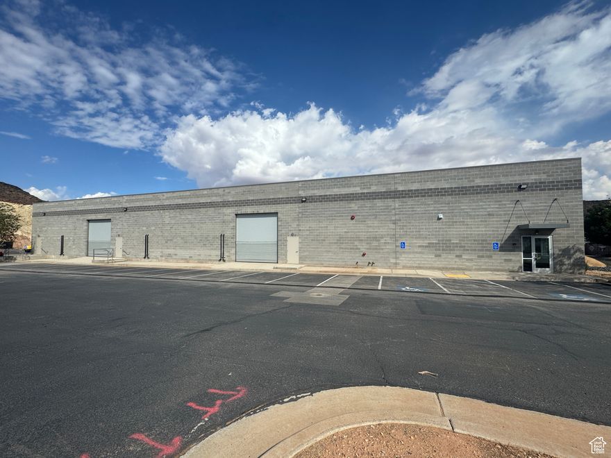 Grouted Block building. 7 man doors, 4 roll up doors 14' high. 2 loading docks with ramp doors. Ceiling height of 16'. Climate controlled with Three phase power. 2, 7.5 ton units in ware house area. Separate HVAC unit for office and conference spaces. Mezzanine space of approx. 1,000 sq. ft. Office/entry approx. 400 sq. ft. 2nd office space, 400 sq. ft Conference room 500 sq. ft approx. Mens and Women restrooms with 3 stalls each, + mens 2 urinals, 1 full ADA bathroom with shower, +1 ADA bathroom. Sellers interested in doing owner financing.