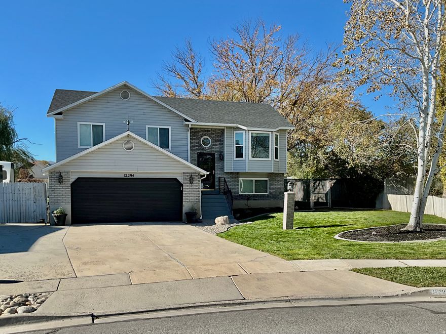 Welcome to your adorable, move-in ready home with amazing Wasatch Mountain views-truly a must-see! This property has been thoughtfully updated, blending charm with modern convenience. The heart of the home is the newly remodeled kitchen, featuring quartz countertops, modern lighting, laminate flooring that flows through the main living areas.  Enjoy updates like the newly finished primary bathroom and the spacious primary walk-in closet. Additional peace of mind comes from the fresh paint, new blinds, and a new water heater.  Outside, entertaining is a breeze on your brand new Trex deck overlooking the big backyard. Maintenance is minimal with secondary water to keep the lawn green all summer, while paid-off solar panels keep your power bills low year-round. Complete with RV parking, newly installed year round lighting and more!  Square footage figures are provided as a courtesy estimate only and were obtained from previous ,MLS  Buyer is advised to obtain an independent measurement.