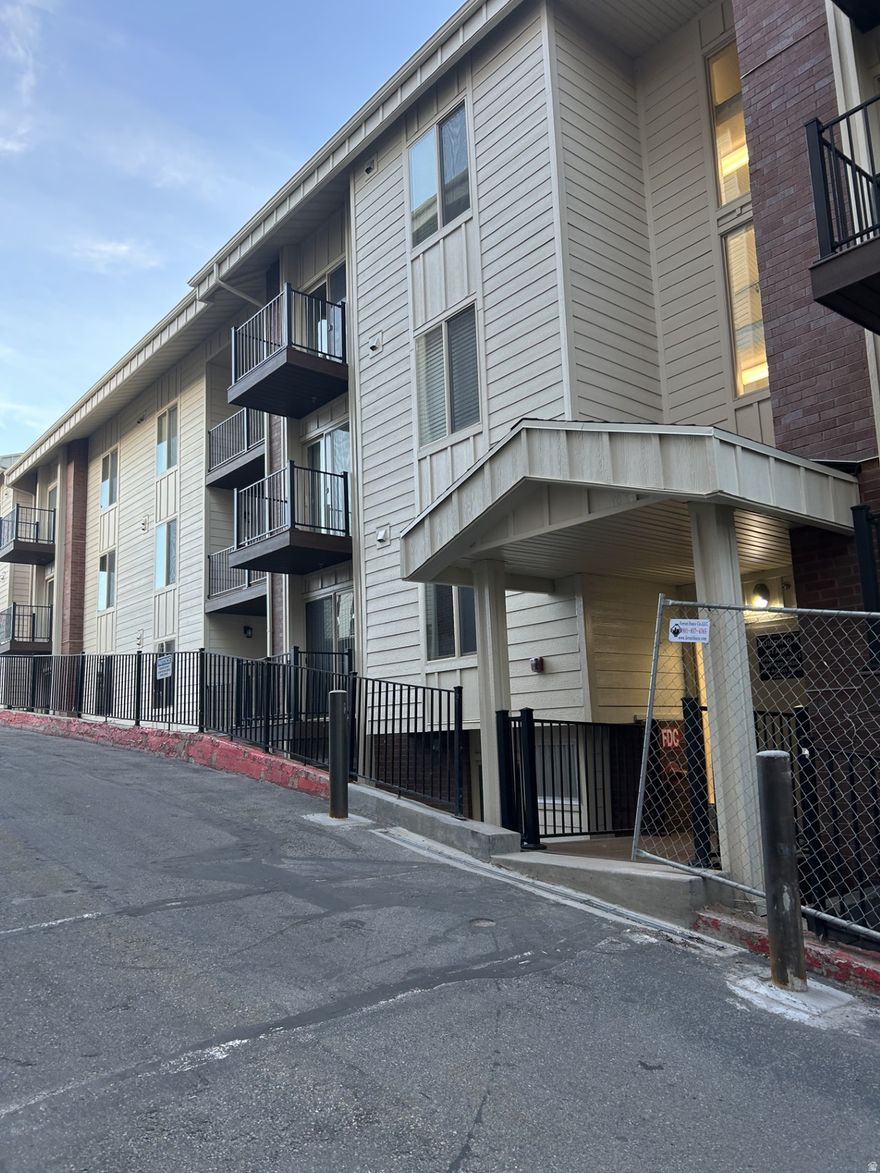 Location,  Location, Location!  Top floor corner unit with views of the city and a balcony to watch the sunset. Newly finished building with modern touches. 3 Blocks from the University, close to trax. Building B is affordable living for new construction. Pool, spa, landscaping and south side stairs are the final steps to complete the project.