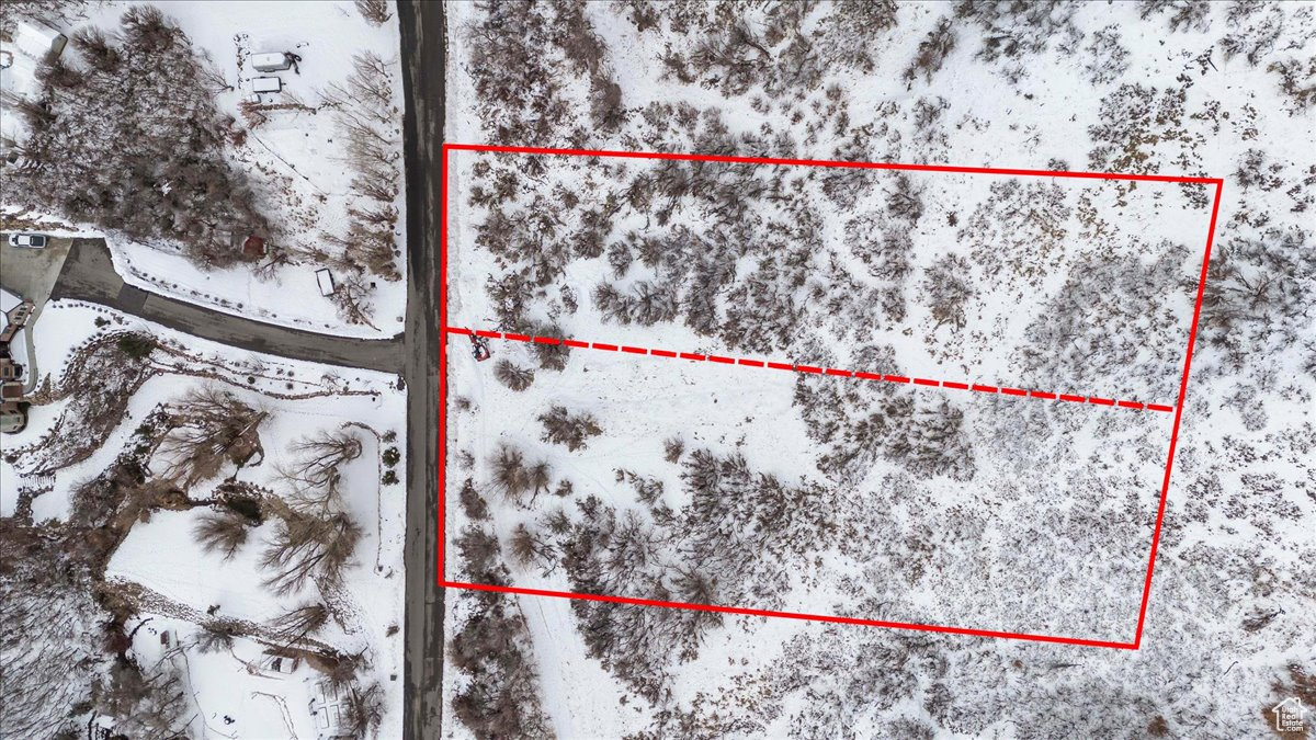 Build your dream home on this stunning one-acre lot in one of Ogden's most prestigious community. Enjoy breathtaking panoramic views of the valley, including the majestic Wasatch Mountains. This prime location offers a rare opportunity to build a luxurious home in a community renowned for its exclusivity and privacy. Surrounded by mature trees and lush landscaping, this lot provides a tranquil setting for your personal oasis. Close proximity to world-class skiing, hiking, and other outdoor activities. Easy access to downtown Ogden and all its amenities. Don't miss out on this once-in-a-lifetime opportunity to own a piece of paradise in Ogden, Utah. Utilities at the curb, ready to build! Bring your own builder or use ours.