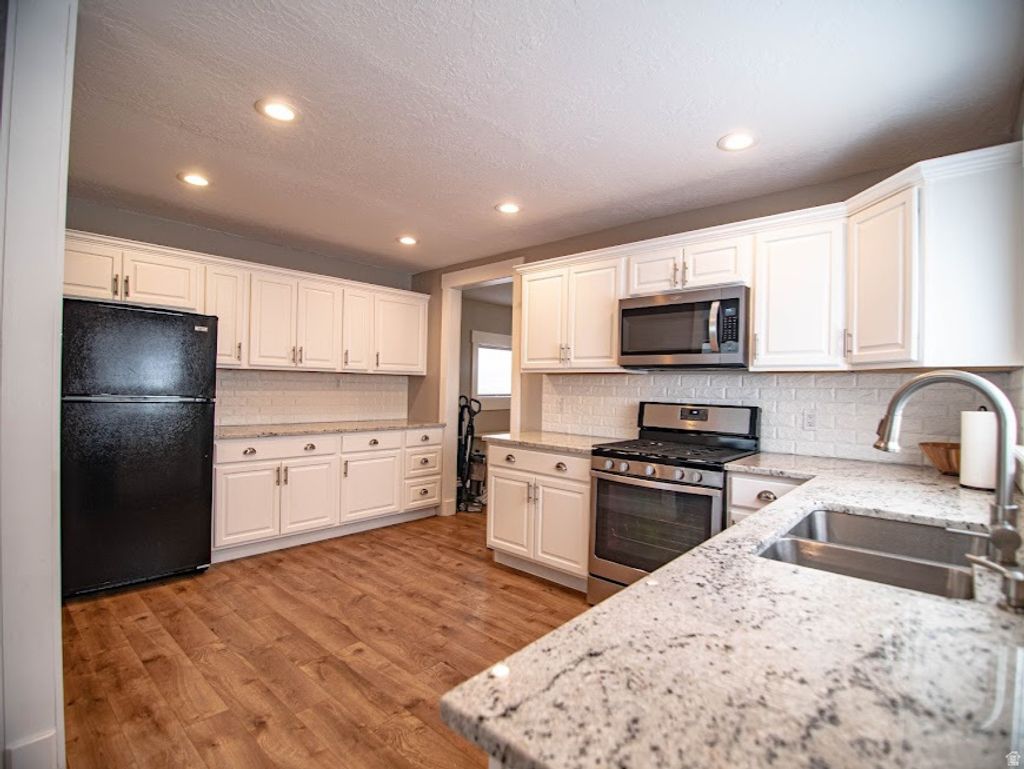 Photo of 141 GARDEN RD, East Carbon, UT 84520 (MLS # 2141718)