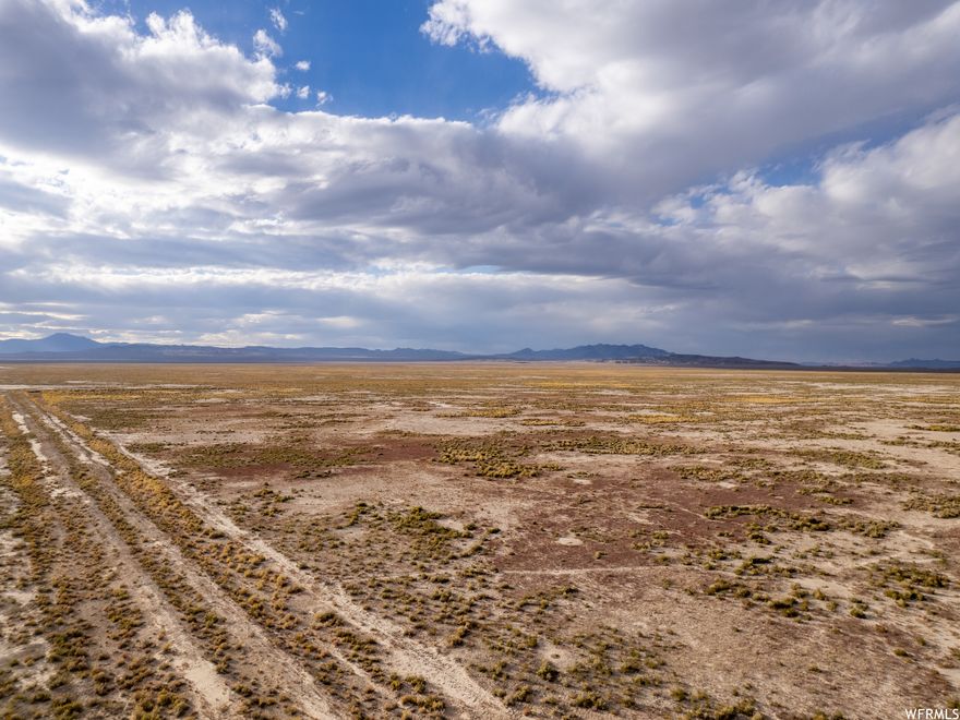 Experience the vast beauty of Hinckley, Utah, with this expansive 240-acre parcel in Millard County. A canvas of endless possibilities, this land presents a unique opportunity to embrace outdoor recreation or off-the-grid living.