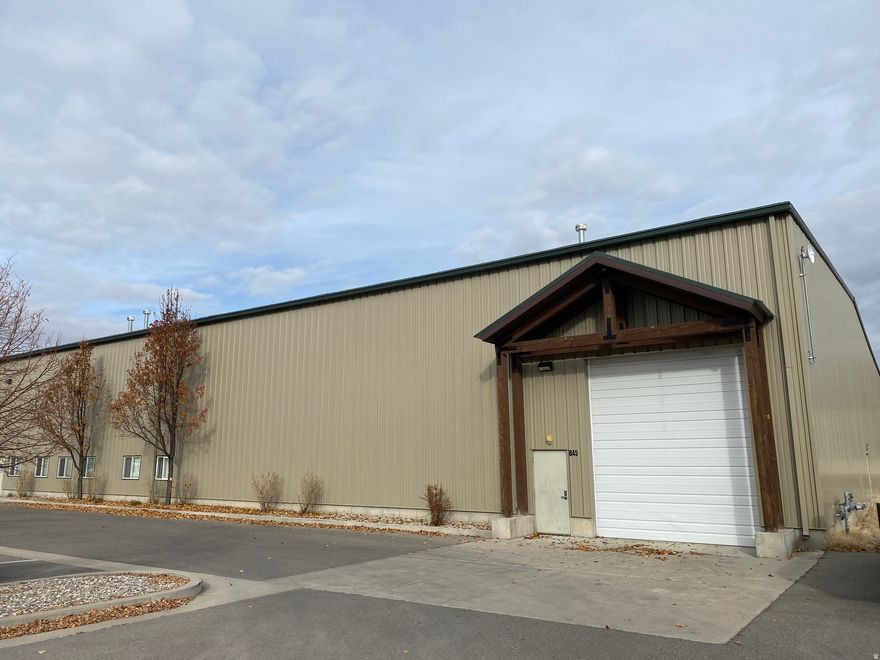 8,000 SF of clean, warehouse space at a great price. A perfect extension of your current warehouse! There is a multitude of storage options and possibilities for all types of businesses in this wide-open floor plan. A great location that is minutes from just about anywhere in the valley. Very well-maintained inside and out. Includes 5" thick concrete floors, fire suppression, new paint, 14' x 12' overhead door, floor drains, multiple entrances, parking, heating, multiple power outlets & landscaping. Semi-truck access.  .14 Cam fees per sq. ft. per month will include property taxes and insurance on the building.