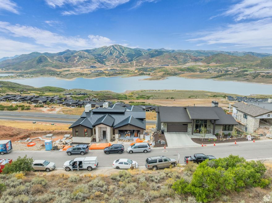 This uphill lot offers unparalleled 180-degree views of Timpanogos, Jordanelle, Mayflower Mountain Resort, and Deer Valley Ski Resort. Adjacent to the community open space, it provides enhanced privacy. The homes across the street are built, so you can see your future forever views. Enjoy the serenity of mountain living while maintaining close proximity to world-class ski resorts, pristine lakes, and dynamic outdoor activities. This is an ideal location for your future residence.