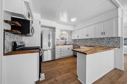 Photo of 7107 S 1245 W, West Jordan, UT 84084 (MLS # 2144417)