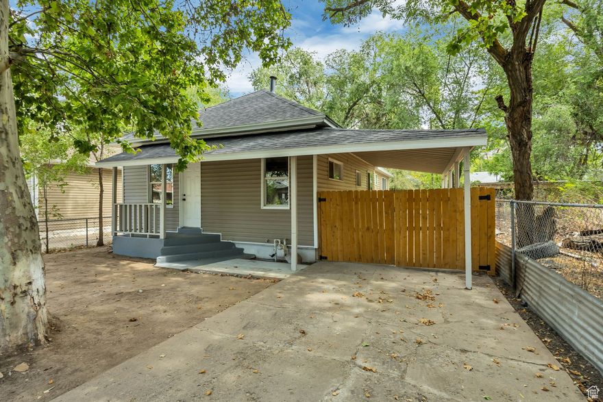 Beautifully remodeled Bungalow Rambler with single level living!  This home has brand new bathrooms, kitchen, plumbing, HVAC and roof!  Down a private lane for a secluded yard with covered parking. Sq ft shown is from the contractors measure for new flooring and paint. Seller's trust is composed of members that are licensed agents in UT. Call your favorite agent for a showing and you can make this home yours!