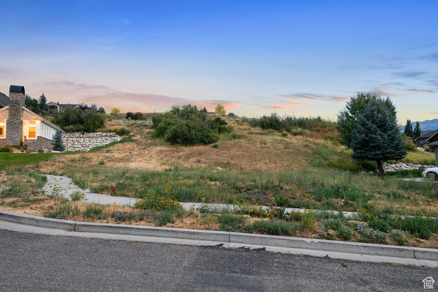 This .36-acre lot in the desirable Cottonwoods subdivision offers a rare opportunity to build your dream home in one of Mountain Green's most sought-after neighborhoods. Situated at the end of a quiet cul-de-sac, this is the last available lot on Spring Circle-a prime location with privacy, incredible views, and unbeatable access to nature.  You'll fall in love with the breathtaking mountain scenery and the abundant hiking, biking, and walking trails just steps from your future front door. Bring your own builder and design the mountain home you've always envisioned.