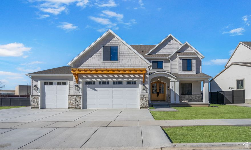 **$50,000 PRICE IMPROVEMENT** THIS HOME IS FEATURED ON "UTAH'S REAL ESTATE ESSENTIALS" as seen on ABC4, HULU+Live TV & Telemundo. Click TOUR for a 3D virtual tour and video of the property. Search address on YouTube for more videos.   Welcome to your dream home, where luxury meets adventure! This spectacular brand new custom masterpiece is nestled in a vibrant neighborhood with breathtaking mountain views, creating the perfect backdrop for your next chapter. The main level dazzles with an enchanting picture window in the great room, filling your home with natural light and views that inspire.The open kitchen, features high-end appliances, an oversized walk-in pantry, stunning tiled backsplash, and custom cabinetry adorned with elegant crown molding.   Retreat to the elegant primary suite, complete with a gorgeous soaking tub, separate shower, and a custom walk-in closet designed for ultimate relaxation. Upstairs, the excitement continues with four additional bedrooms, two full baths, a spacious laundry room, and a versatile loft for your creative pursuits. The finished basement offers incredible flexibility with a separate apartment that includes two bedrooms, a laundry room, full kitchen with large island and pantry, and its own separate entrance, ideal for rental income or guest stays.  Immerse yourself in the active lifestyle this location provides, just moments away from parks, schools, shopping, dining, and outdoor adventures like the Murdock Trail, Provo Canyon, and Sundance Resort for year-round fun! Don't miss out on this extraordinary opportunity to call this magnificent property your own-schedule your exclusive tour today!  Some images show digitally enhanced landscape/fencing to illustrate its potential for a stunning outdoor transformation.