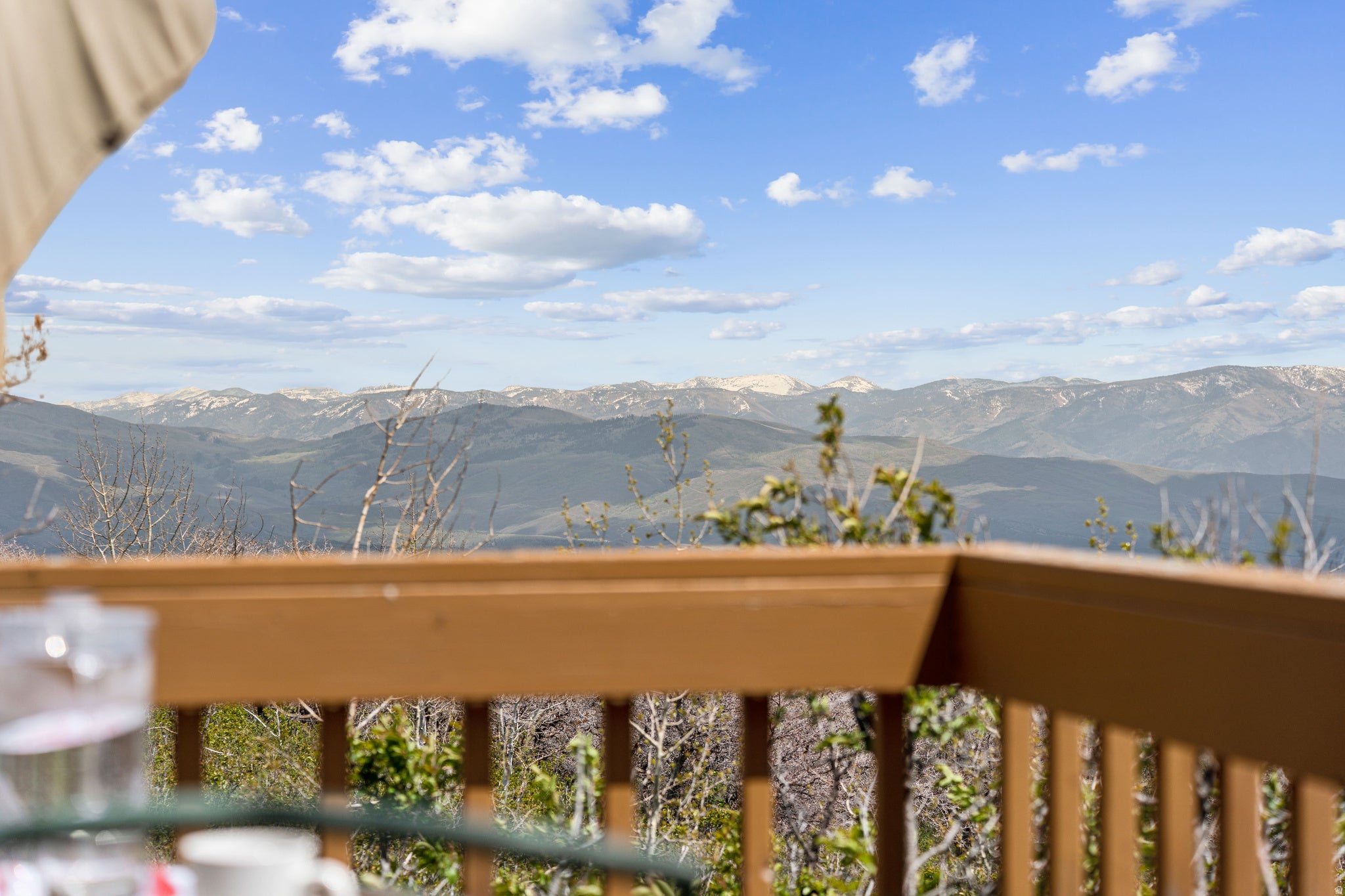 Panoramic Views - Uninterrupted ridgeline views stretching across the horizon from the deck railing.