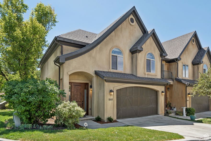 Beautiful townhome in Holladay.  The Archer Gardens Community is known for its Tuscan-inspired architecture and built with quality craftsmanship. This spacious end-unit features 9' ceilings, granite countertops, tile flooring, custom moldings, a cozy gas fireplace and a private patio with stunning mountain views. The bright, airy primary suite boasts vaulted ceilings and a luxurious ensuite with a large, jetted tub, separate walk-in shower, and generous walk-in closet. The unfinished basement provides endless potential-finish it your way and watch your equity grow. Enjoy maintenance-free living with exterior upkeep, snow removal, water, and insurance all included. Ideally located, you'll have quick access to dining, shopping, major freeways, and endless outdoor recreation.