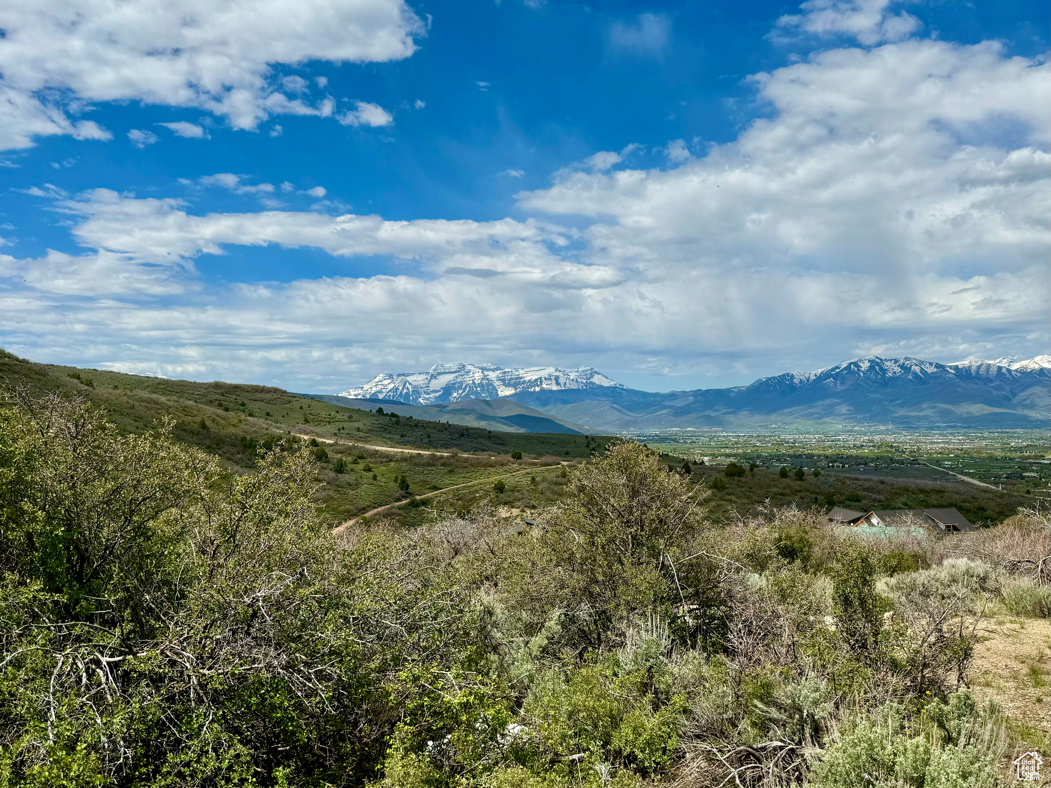 Enjoy unbelievable, sweeping views of the Wasatch back from this amazing 1.1-acre lot that is completely READY TO BUILD ON! This lot has ALL the footwork done to build IMMEDIATELY including, not only a passing perc test and topography survey, but an APPROVED septic design for a 4-bedroom mountain home and engineered, APPROVED architectural house plans for an incredibly well-designed, stunning custom-built mountain home. This is the ideal location for your dream mountain retreat or full-time residence! With year-round access adventure is always within reach. Explore endless outdoor activities, from hiking, ATV-ing, and world-class skiing to epic snowmobiling, fishing, and golfing. Whether you seek to create your own peaceful getaway or a magnificent year-round home, this property offers the best of both worlds, seclusion in nature with the conveniences and wonderful amenities of Heber Valley and Park City just minutes away!