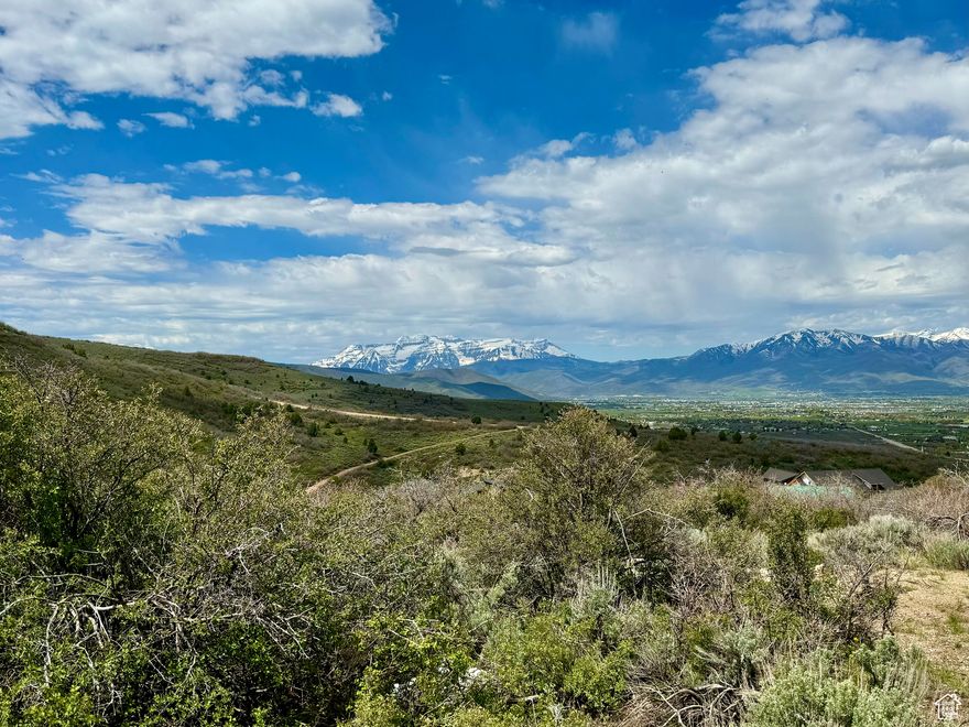 Enjoy unbelievable, sweeping views of the Wasatch back from this amazing 1.1-acre lot that is completely READY TO BUILD ON! This lot has ALL the footwork done to build IMMEDIATELY including, not only a passing perc test and topography survey, but an APPROVED septic design for a 4-bedroom mountain home and engineered, APPROVED architectural house plans for an incredibly well-designed, stunning custom-built mountain home. This is the ideal location for your dream mountain retreat or full-time residence! With year-round access adventure is always within reach. Explore endless outdoor activities, from hiking, ATV-ing, and world-class skiing to epic snowmobiling, fishing, and golfing. Whether you seek to create your own peaceful getaway or a magnificent year-round home, this property offers the best of both worlds, seclusion in nature with the conveniences and wonderful amenities of Heber Valley and Park City just minutes away!