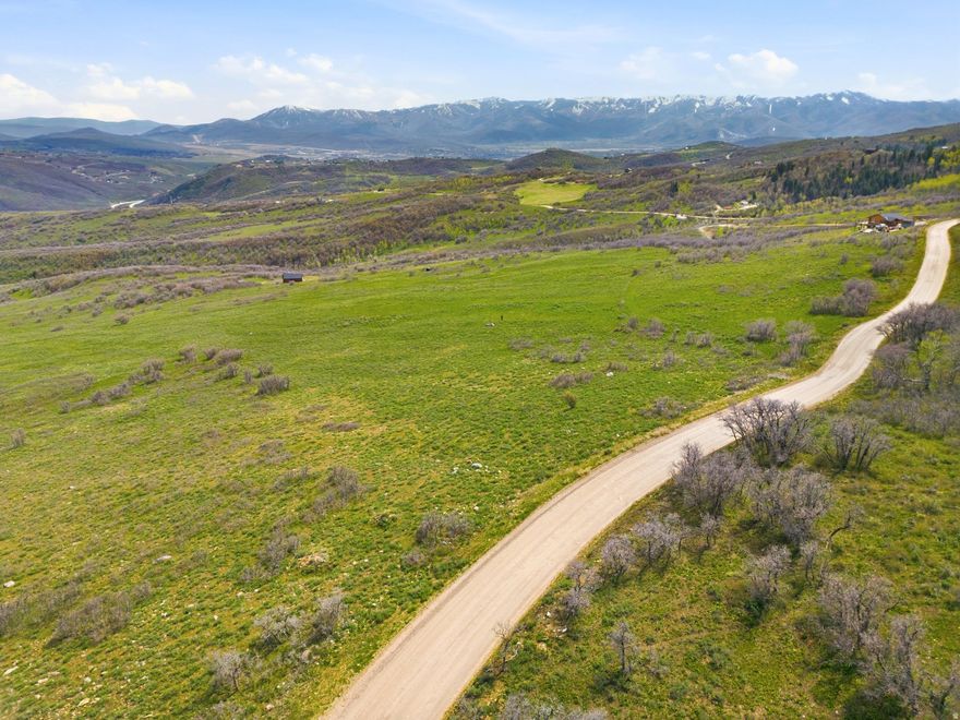 Located in the Forest Meadows community in Tollgate Canyon, this expansive 9.74 acre property boasts easy year round access with stunning panoramic views of the Wasatch Mountains and valleys below. If you have been looking for your piece of big sky country, this is it! This property features plenty of relatively flat terrain for building your dream mountain oasis, as well as scrub oaks that are inviting for the local deer, elk, and moose. This property is a nature lover's dream come true! Tollgate Canyon allows residents to live close enough to Park City to take advantage of world class powder days but still live a peaceful mountain lifestyle. Even better, the Salt Lake Valley is a quick commute down I-80, making Tollgate a favorite retreat for those looking to escape city life. With so much acreage, let your imagination run wild!