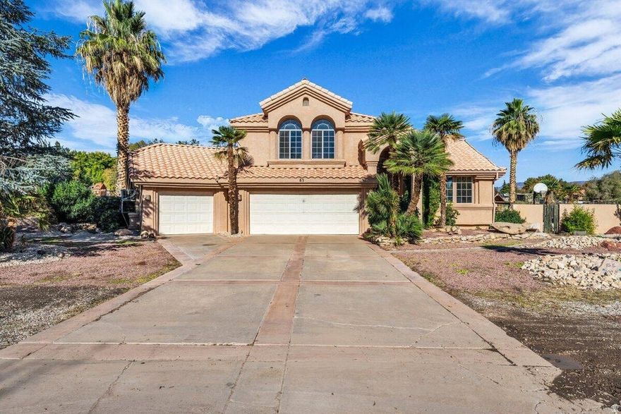 Don't miss this rare opportunity to own a stunning 6-bedroom, 4.5-bath home with no HOA, nestled in a peaceful neighborhood. This beautifully maintained property has been tastefully updated with new flooring, fresh paint, and a newer HVAC system. Bright natural light floods the open and inviting floor plan, perfect for both everyday living and entertaining. The massive 5-car garage provides abundant storage, while the large driveway offers plenty of space for RV parking. Set on an impressive 0.87-acre lot, you'll love the private backyard oasis complete with a sparkling pool, detached shop, and a charming casita, ideal for guests, generational living, or rental potential. With its quiet location near lakes, shopping, and national parks, this property truly has it all and is vacant for easy showings! Buyer to verify all information, deemed reliable, however buyer to verify all info including utilities, rental restrictions, and HOA information if applicable.