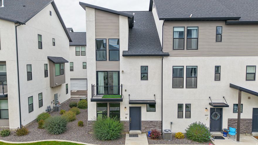 Be sure to check out the 3D tour. This stunning end-unit townhome shows like a 10 and is perfectly situated on the north end of Payson and right on the Salem/Payson border. Enjoy modern finishes throughout, including low-profile carpet, LVP flooring, and 9-foot ceilings on all three levels. The upgraded kitchen features white 42" soft-close cabinets, granite countertops, and a balcony just off the dining area-ideal for relaxing. Additional highlights include upgraded recessed lighting, abundant windows that fill the home with natural light, two spacious family rooms, vaulted ceilings, roller shades, and a water softener. The master suite offers a generous walk-in closet and a peaceful retreat. Conveniently located near freeway access, shopping, and dining, and within the highly sought-after boundaries of Salem schools. Best of all, this property is not located in a PID!