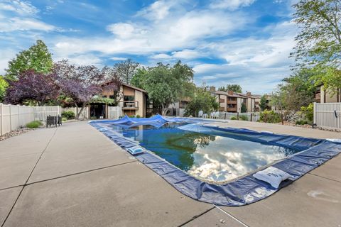 Tiny photo for 6859 S COUNTRYWOODS CIR #E17, Cottonwood Heights, UT 84047 (MLS # 2135050)