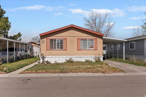 Photo of 1272 W CHICKADEE St S #60, Salt Lake City, UT 84123 (MLS # 2145205)