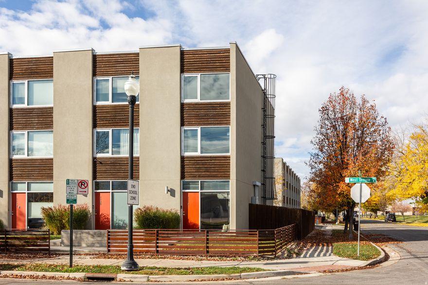 This rowhaus in the Ballpark neighborhood is a ringer for pretty much anyone in the market for a well-designed, spacious home in an incredible location. This particular development is characterized by a clean, minimalist, and intuitive design, along with the kind of details that create a warm and welcoming space. The main level is open and bright-guests enter the primary living area, then the dining and kitchen-ideal for entertaining, whether the night calls for a quiet meal for 4 or a bustling party and countless guests. This level also walks out to a sizable back yard (bigger than other units here, thanks to its location on the end), creating the perfect outdoor space for dining al fresco, taking in some sunshine, or letting your pup explore and lounge (bonus: it's also pre-wired and ready for a hot tub, so be sure to add that to your holiday wish list). The bedrooms upstairs are roomy and bright: large closets and bathrooms are accompanied by unobstructed views. As far as updates go, little is needed here, but a new water heater and A/C were installed in 2022, and the washer and dryer were both replaced earlier this year. A two-car garage means no window scraping after frozen nights, but you may not even have to worry about driving, what with such a central location and all. Sitting in the ballpark neighborhood, this is an ideal home for those who want to be close to downtown SLC, within walking distance of all things Central Ninth (ahem, The Pearl, Maven West, Cosmica, Nohm, Water Witch, Central Ninth Market, Laziz, Blue Copper Coffee, Orchid Dynasty, Scion Cider, SLC Bike Collective...the list goes on). You're also just steps away from TRAX and only 15 minutes from the airport. In other words? You're home. Square footage figures are provided as a courtesy estimate only.  Buyer is advised to obtain an independent measurement.