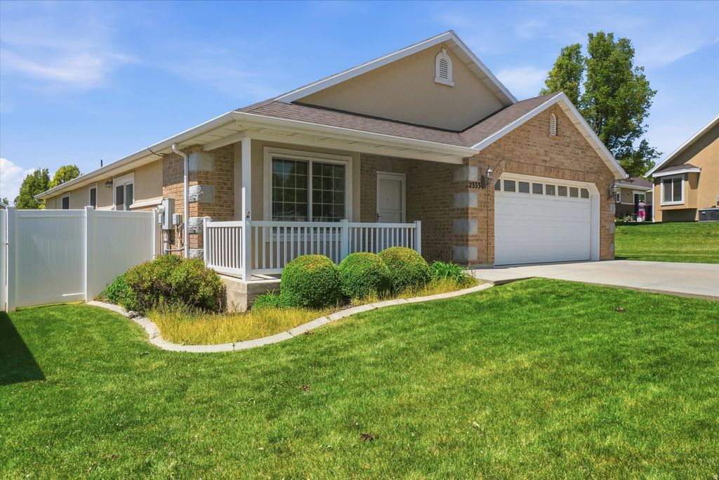 Photo of 2333 N GARDEN LN W #32, Layton, UT 84041 (MLS # 2157120)