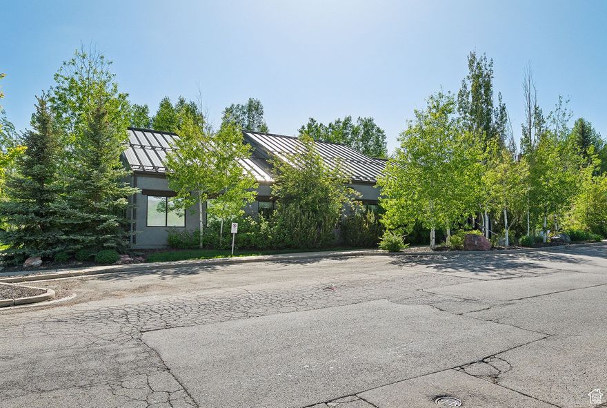 Exceptional opportunity to own a professional office building in Park City, Utah. This well-maintained property features 12 private offices and 12 large workstations, designed for maximum productivity and flexibility. Located Just off of I-80 within a thriving retail hub, this turnkey building is ideal for businesses seeking a prestigious address in a high-traffic, high-visibility area. Currently in active operation, the space offers immediate functionality for professional services, tech, or co-working use. Don't miss this rare investment in one of Utah's most dynamic commercial corridors.