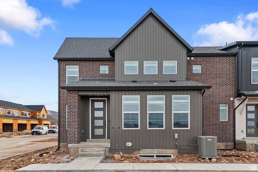 Discover this beautiful Hovden townhome with a thoughtful design in a great Francis community! Featured you will find an inviting kitchen with warm cotton maple cabinets, elegant quartz countertops, tile backsplash and stainless steel gas appliances. The interior is styled with a blend of laminate hardwood, tile, and carpet flooring for comfort and durability. Enjoy the a modern owner's bathroom with cultured marble shower surrounds and black matte hardware. A metal railing adds a contemporary touch to the stairway, completing this home's refined, functional appeal. Comes with full yard landscaping for a turn key experience!