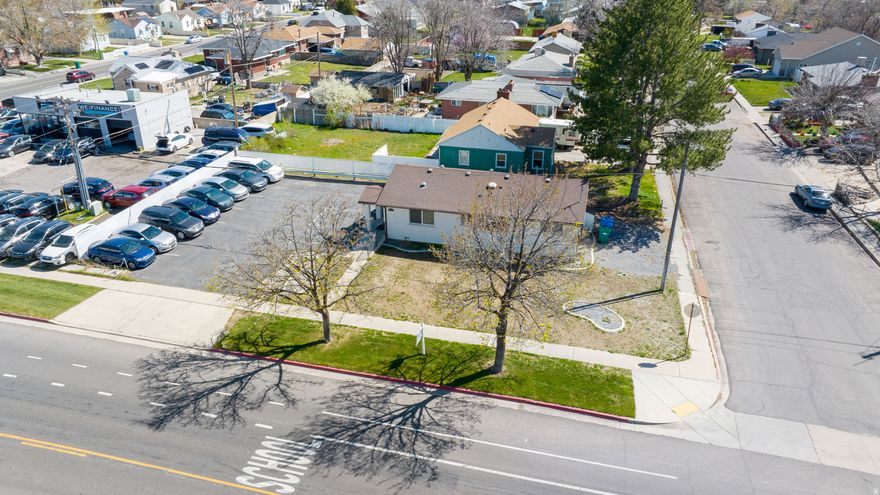 Recently remodeled brick office building, ZONED C2 which allows for many potential uses! Currently being used as an AUTO DEALERSHIP, and was previously used as a spa/beauty salon. Good investment opportunity renting for $3,800/mo (will be raising rent soon) with tenant paying the utilities! The current tenant would love to stay but could vacate if desired. Ample parking, high visibility, and quick freeway access! This is a great place for your small business.