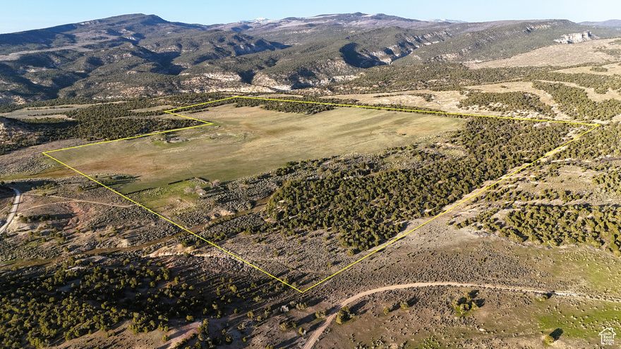 Pristine meadows, plentiful wildlife, tillable acreage, and ample water set this property apart as one of the premier private land parcels in central Utah. This 190-acre parcel is located at the gateway to Fishlake National Forest, nestled against the slopes of Oak Ridge, and about a mile off the paved Gooseberry Road and I-70. This legacy property has been owned by the same family for generations and has been well-maintained over the years, resulting in a pristine parcel ready to be developed and enjoyed.  In years past, this parcel was home to premium-producing tillable acreage and was homesteaded in the 1800s. While the farming operation has faded with time, the infrastructure and rich soils remain, offering the next owners the opportunity to farm or graze while enjoying the many recreational opportunities the area has to offer. Nearly 100 acres of this property are in semi-irrigated meadows offering premium grazing for cattle. A gravity-fed irrigation system helps make use of the ample water resources in the area. Further adding to the value are multiple springs running on and through the property, which provide plenty of water for both cattle and wildlife alike.  Speaking of wildlife, this property is home to elk, mule deer, turkeys, and many other species. The property is entitled to two cow elk depredation tags each year, with the possibility to acquire an additional two cow elk tags through the Utah Division of Wildlife Resources. With the property being surrounded on three sides by Fish Lake National Forest, the hunting and recreational opportunities are excellent.   The northeastern portion of the property, as well as the south, is covered in sage and pinyon-juniper forest, providing both privacy and sanctuary for local wildlife with over 70 wooded acres. If you are looking for a one-of-a-kind private homesite or a place to put your cabin/getaway property, this 190-acre parcel offers several locations for development. With mountain views, no neighbors, and excellent access, the potential of this slice of paradise is ready to be unlocked!
