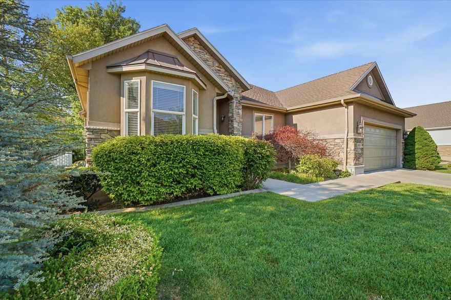 Situated in a prime location, overlooking the prestigious Oakridge Country Club 6th green. Designed with comfort and functionality in mind, this home offers an open floor plan ideal for entertaining and relaxing. The windows along the back of the home invite natural light and showcase peaceful views of the golf course. Walk out to your brand new 12x23 deck to enjoy the evening sunsets and manicured green or snuggle in for the evening with your cozy rock fireplace. New roof and gutters in July 2019 and HVAC/Water Heater Dec 2023. Included is the convenience of single level living with everything you need on the main level and the bonus of a finished basement with lots of storage. The basement adds flexibility with a wet bar, ample storage and spacious gathering area w'large windows bringing in natural light.  The HOA also offers a private walking path around a common grass grass area, community sports court, and playground. Don't bother bringing your lawn mower since the HOA handles yard care for your home both front & back which means not only will your yard look great but so will all of your neighbor's yards. This home is located near several freeway entrances and the Farmington Commuter Rail Station for a fast commute in all directions. Also located near Station Park, Lagoon, Cherry Hill and obviously the Oakridge Country Club.