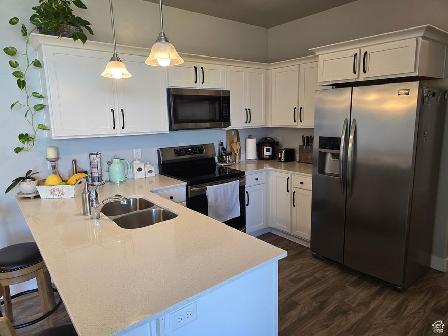 $20,000 in upgrades to the High Efficiency Heating and Cooling system, New Water Heater, New Water Softener, New $1,200 Convection oven where you can air fry something delicious to eat. Appliances have been replaced so you will not have to. Great location close to the bus stop and a clubhouse with gym, pool, and steam room directly across the street. Great views of the Mountains and Utah Lake. You will be able to let your creative vision soar in this top level unit with Vaulted ceilings. Waters Edge is a Energetic master-planned community in Vineyard, Utah. Conveniently located just west of Orem in the town of Vineyard, Waters Edge encompasses more than 400 acres between I-15 and the eastern shoreline of Utah Lake. It's an active-lifestyle community that includes nearly 7 miles of walking and biking trails that weave through community. There are multiple clubhouses, pools, and over 78 acres of open space. Wonderful floor plan at a great location.