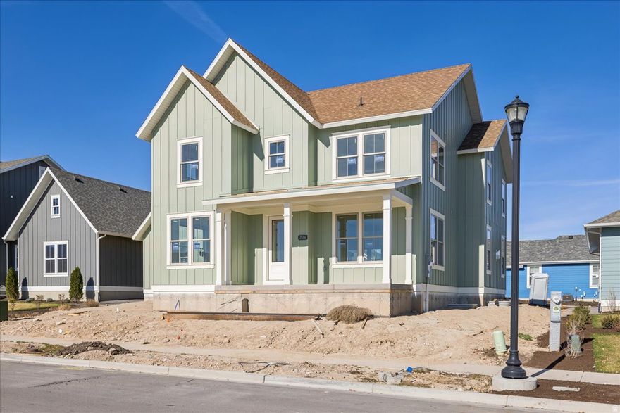 Introducing the Ridgefield Farmhouse at Cascade Village-where modern function meets timeless charm in one of Daybreak's most desirable neighborhoods near the Watercourse. Part of the exclusive Traditional Collection, this thoughtfully crafted home features a spacious open-concept design that seamlessly connects the kitchen, great room, and dining area for both everyday living and effortless entertaining. Just off the entry, enjoy a cozy sitting room and a versatile flex space-perfect for a home office, study, or playroom. The luxury owner's suite offers a private retreat with an oversized walk-in closet and elegant finishes, while a tandem 4-car garage with side door provides ample room for vehicles, storage, or even a home gym. With its expansive covered front porch, inviting curb appeal, and elevated design, the Ridgefield Farmhouse delivers flexibility, style, and comfort right in the heart of Daybreak's Cascade Village.