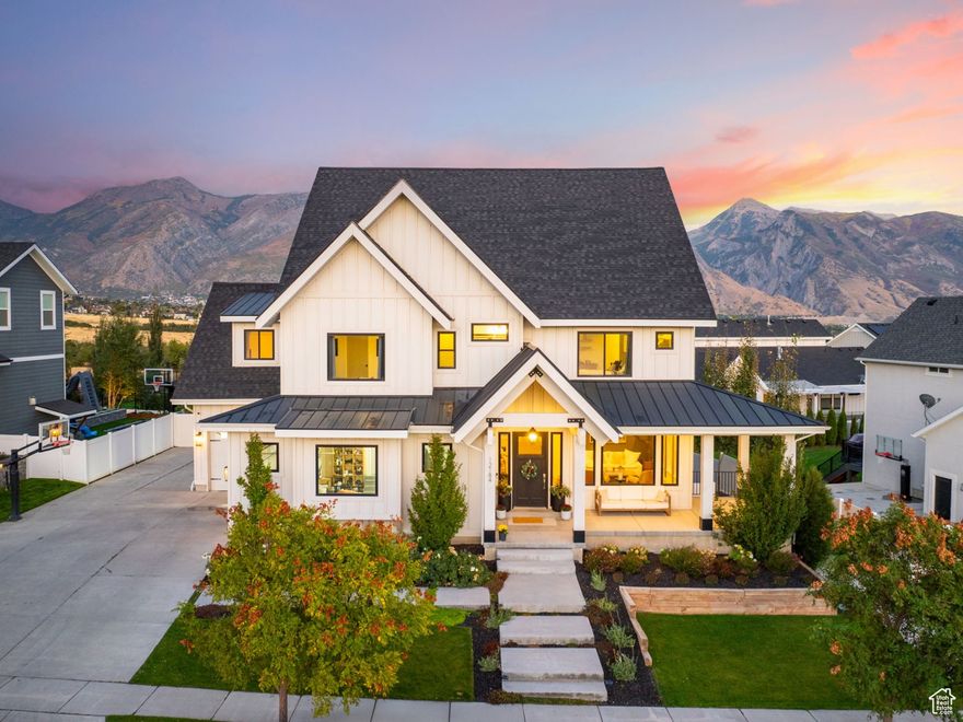 An absolutely stunning home in the most popular Highland neighborhood  Skye Estates! This custom home was flawlessly designed and has top of the line finishes such as engineered hardwood floors, decorative coffered ceilings, a double kitchen island, 4 ovens, and an open butler pantry. The primary bedroom has a private balcony with one of the most breathtaking views in Utah County and the bathroom is paired with a massive walk-in closet. The basement offers a theater room, play area and separate mother-in-law apartment. Outside, you'll find another balcony overlooking the huge grassy and fenced-in yard with incredible mountain views. And just a few blocks away sits the community pool that comes in clutch during the summertime. You deserve this home! Call/text Mike Gooch whenever for a private tour!