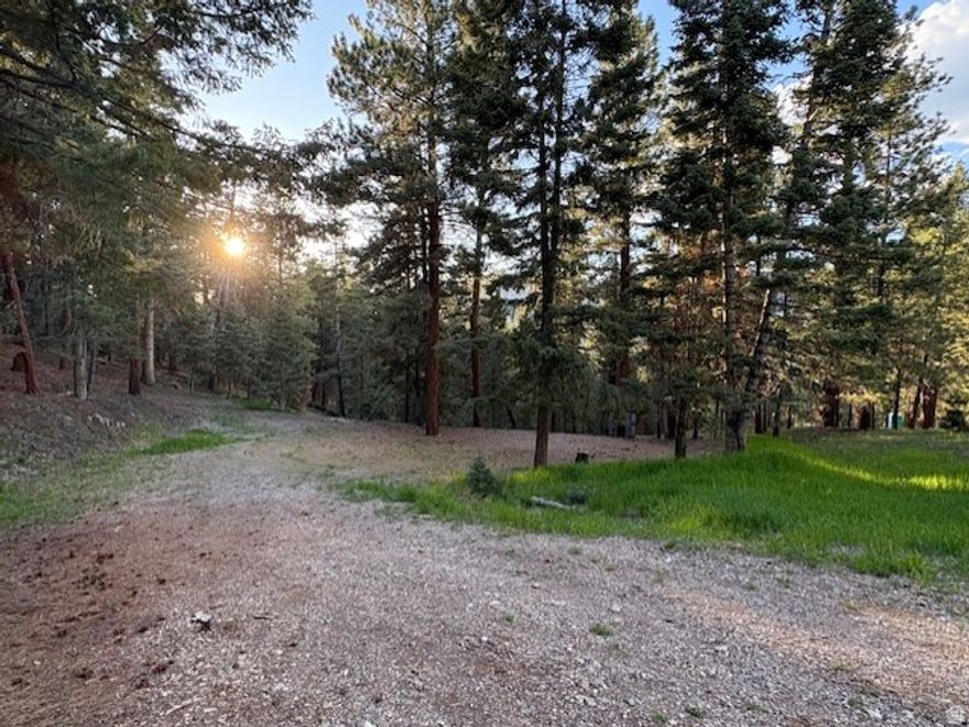 Nestled in the serene and sought-after Whispering Pines Subdivision, this rare 1-acre lot is a true gem waiting for you to make your own. This incredible lot boasts full hookups for two RVs, making it an ideal choice for outdoor enthusiasts and family gatherings. Imagine having the freedom to explore the great outdoors while enjoying all the comforts of home! With spacious sites for your RVs, you can easily accommodate friends and family for unforgettable weekend getaways. Location is everything, and this property is perfectly positioned between the picturesque Little Reservoir and Kents Lake, providing ample opportunities for fishing, boating, and hiking right at your doorstep. Experience the tranquility of living surrounded by nature, all while having easy access to nearby recreational activities. Don't miss out on this rare opportunity to own a piece of Whispering Pines. Whether you envision a cozy cabin, a luxurious retreat, or simply a quiet space to escape the hustle and bustle of daily life, this property is the canvas upon which you can create your ideal lifestyle.